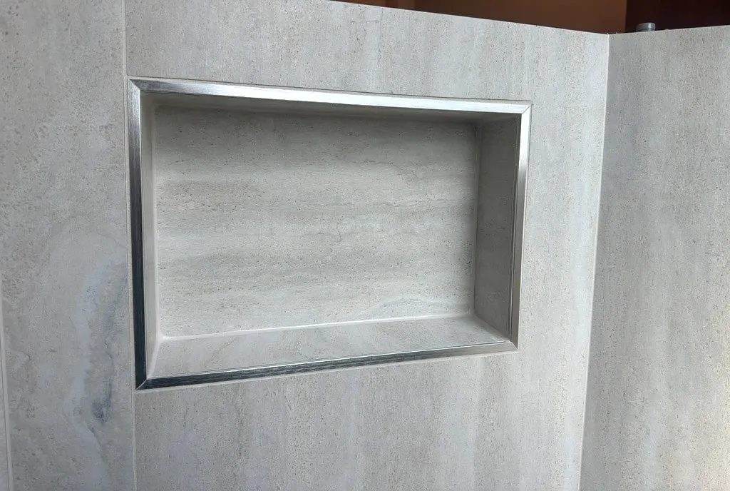 Close-up of the recessed niche with metal trim